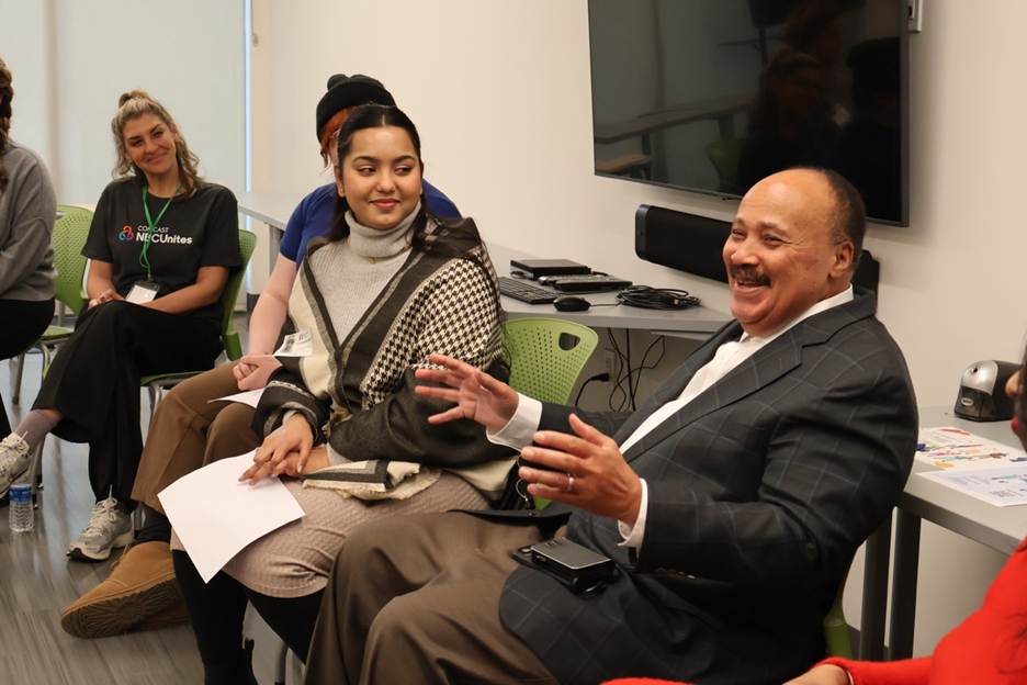 A group of people sitting in chairs
AI-generated content may be incorrect.