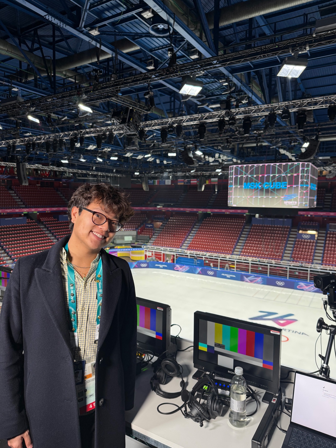 A person standing in front of a computerAI-generated content may be incorrect.